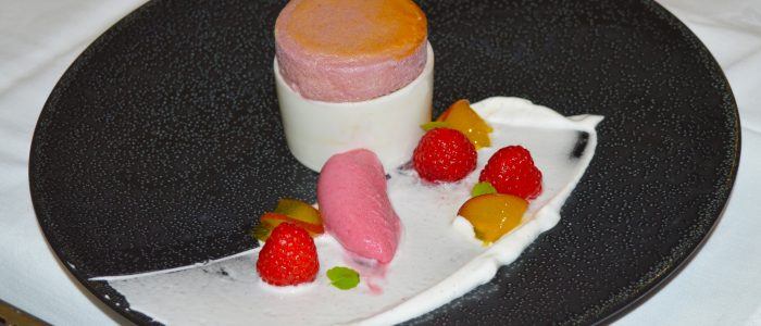 Raspberry Soufflé with blood peach sorbet, compressed peaches and raspberry gel - Stir it up Magazine