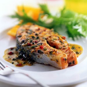 Salmon with Orange and Peppercorn Butter Sauce - Stir it up Magazine