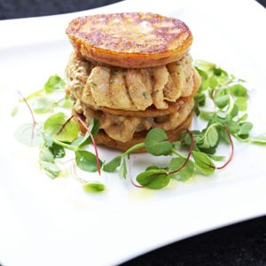Smoked Paprika Coriander Prawns bound with Creme Fraiche, Sun Dried Tomato Blini with a Citrus Dressing - Stir it up Magazine
