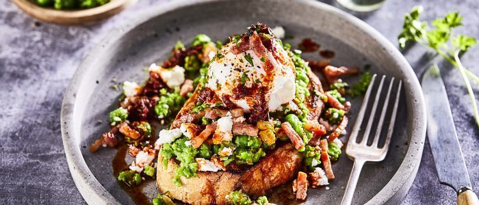 Smashed Peas on Toast with Poached Egg and Crispy Bacon - Stir it up Magazine