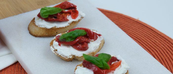 Roasted Red Pepper and Goats Cheese Crostini with Watercress Pesto - Stir it up Magazine