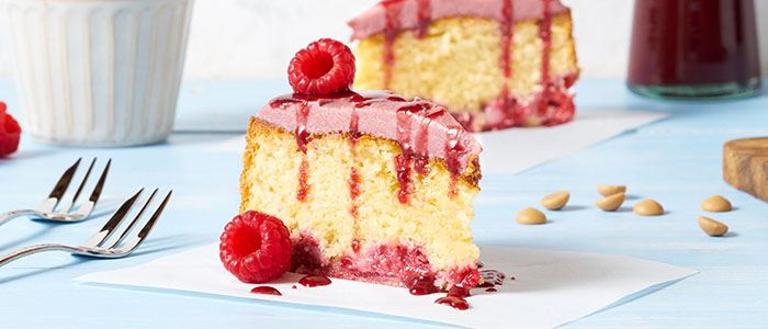 Gold & Ruby Chocolate Cake with Raspberry Coulis - Stir it up Magazine